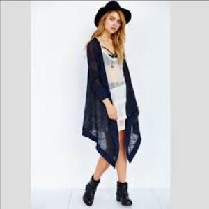 This item is a Urban Outfitters Kimchi Blue Open Front Asymmetrical Cardigan